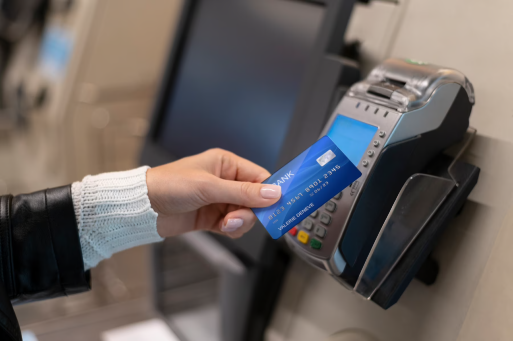 patient using kisok machine for payment of hospital bill